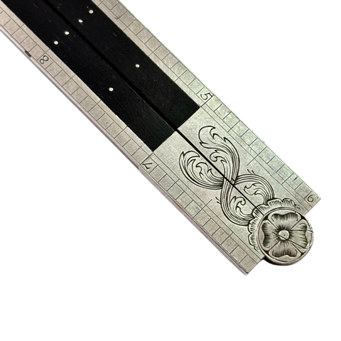 Silver and ebony ruler