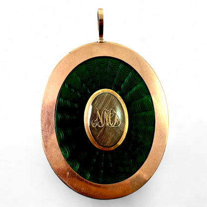 Memorial enamelled gold pendant