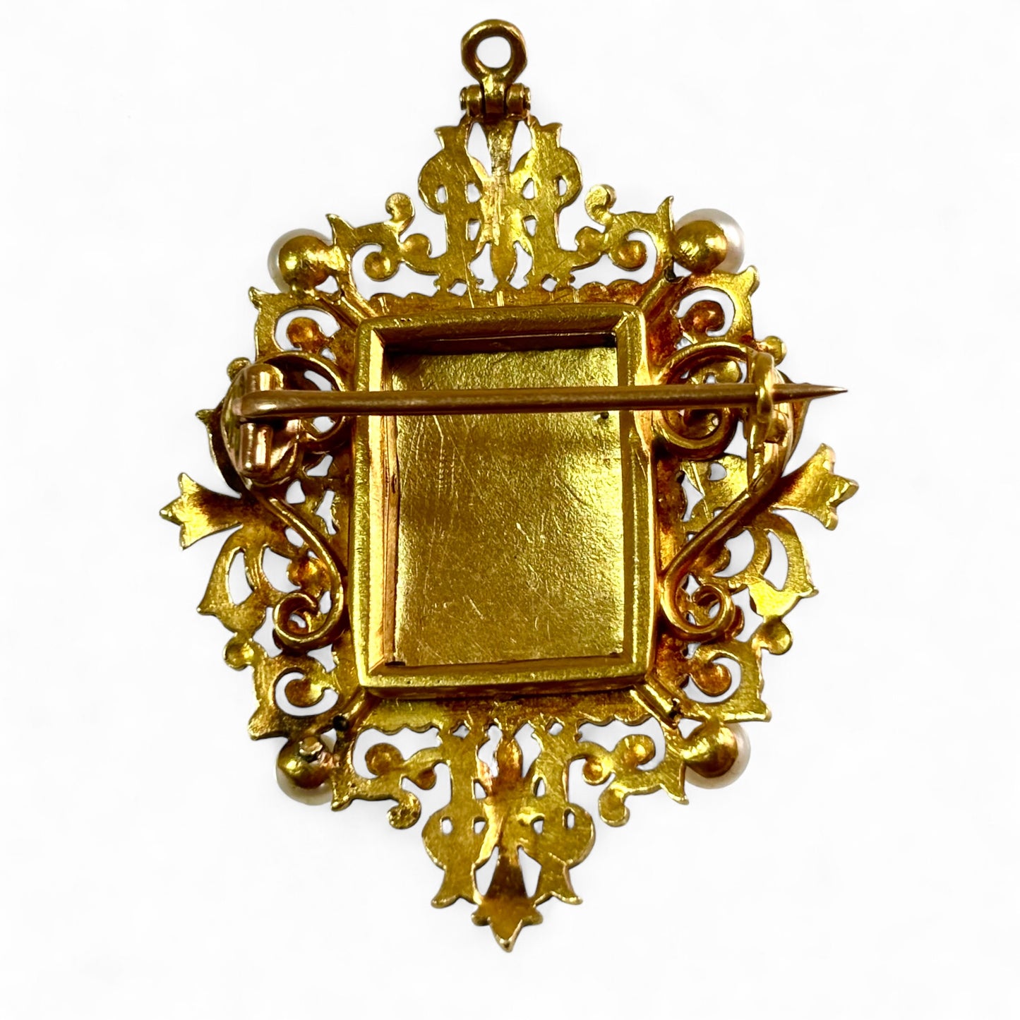 Renaissance revival gold brooch